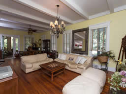 Notice the beamed ceilings and heart pine floor