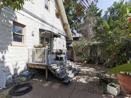 Relax on the patio in the fenced side yard.
