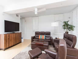 Notice the high-end Plantation shutters throughout.