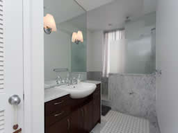 You'll enjoy this lavish bath with lots of marble accents.