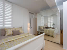 A mirrored wall adds to the sense of space here.