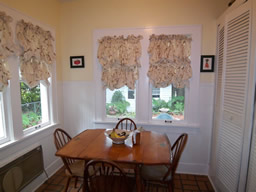 What a fabulous breakfast room overlooking the back yard!