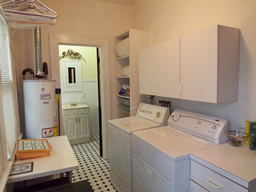 There's a nice inside laundry room and a half bath.