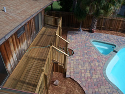 This wide deck runs along the rear of the home