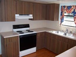 The kitchen has lots of cabinets and counter space