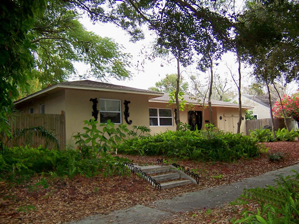 Charm and style are the hallmarks of this lovely home on the shores of Boca Ciega Bay.