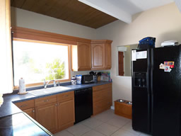 The kitchen is bright and roomy.