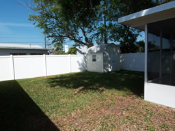 There's a storage shed and nice fencing