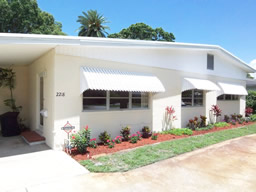 Trim landscaping gives nice curb appeal