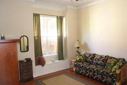 The second bedroom has a window bench for extra storage.