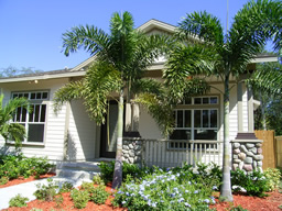 The charming front porch invites you to come inside.