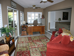 This family room opens to the lanai.