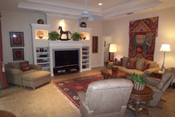 The family room is designed around built-in entertainment and display space.