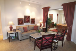 The formal living room is spacious and inviting.