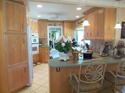 Notice the tall pantry storage