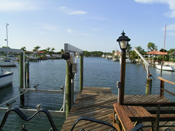 A boater's dream with boatlift, dock and davits in your own back yard. 