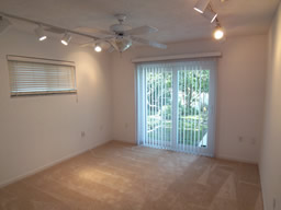 This bedroom opens to the pool deck.