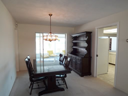 The dining room opens to the Florida room
