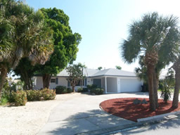 A circular drive leads to the covered entry