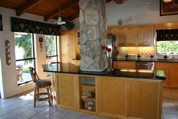 The spectacular kitchen has stainless steel appliances