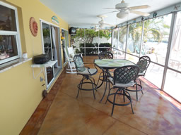 A screened poolside lanai is ideal for outdoor living