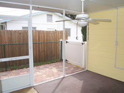 A screened porch is adjacent to the Florida room.