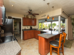 The kitchen flows freely out to the lanai.