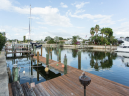 The dock has electric and water service and can accommodate several boats.