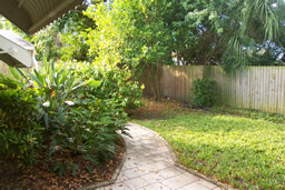 Pathways and lush landscaping make the yard inviting