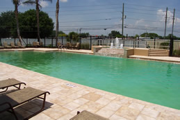 The community pool with a fountain is spectacular