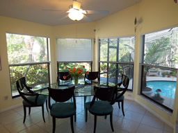 The dining area overlooks the pool