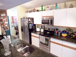 Appliances are stainless steel, counters are granite