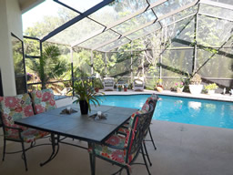 Enjoy casual means on the covered lanai poolside