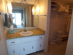 There's a private bath and a walk-in closet.