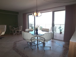 Notice the floor tile detailing in the dining area.