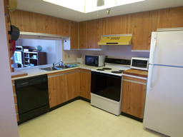 The kitchen is spacious & bright.