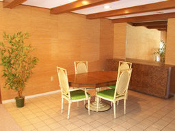 A spacious dining area is adjacent to the living room & kitchen.