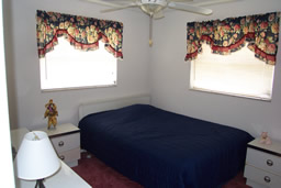 The bedrooms are spacious and bright.