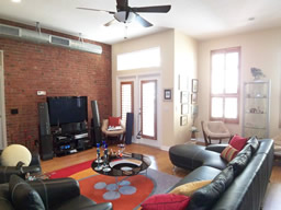 Notice the exposed brick and high ceilings.