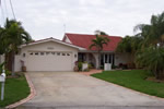 Updated, modern home with vaulted ceilings & great room plan. Great kitchen with granite counters & stainless steel appliances. 18" ceramic tile floors, spanish tile roof, new dual-pane windows & doors.