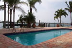 Premier Redington Beach cul-de-sac address offers over 100 feet of deep, wide open, sunset view water.