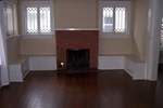 This charming fireplace is typical of the coziness and warmth throughout the house. 